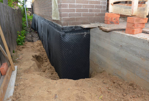 Happy homeowners after waterproofing job in Millersport